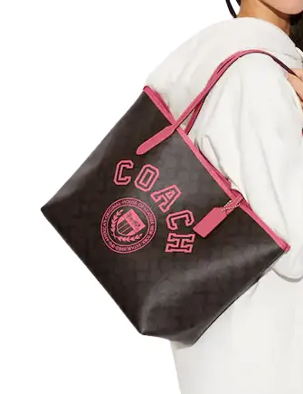 Coach City Tote In Signature Canvas With Varsity Motif